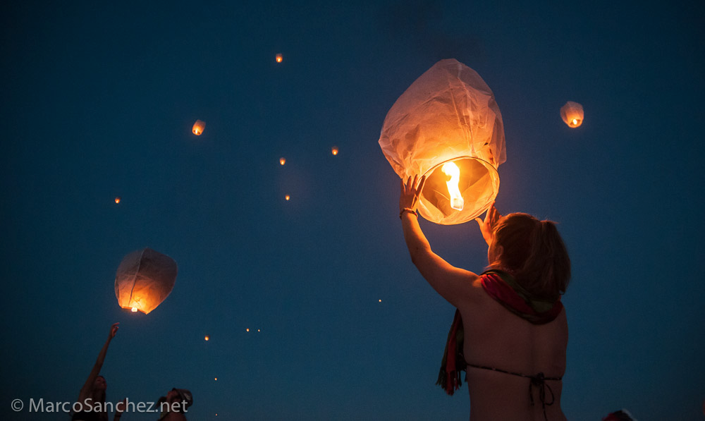 Hot air lanterns being released at the Burning Man Festival. Photo by Marco Sanchez, via Flickr Creative Commons